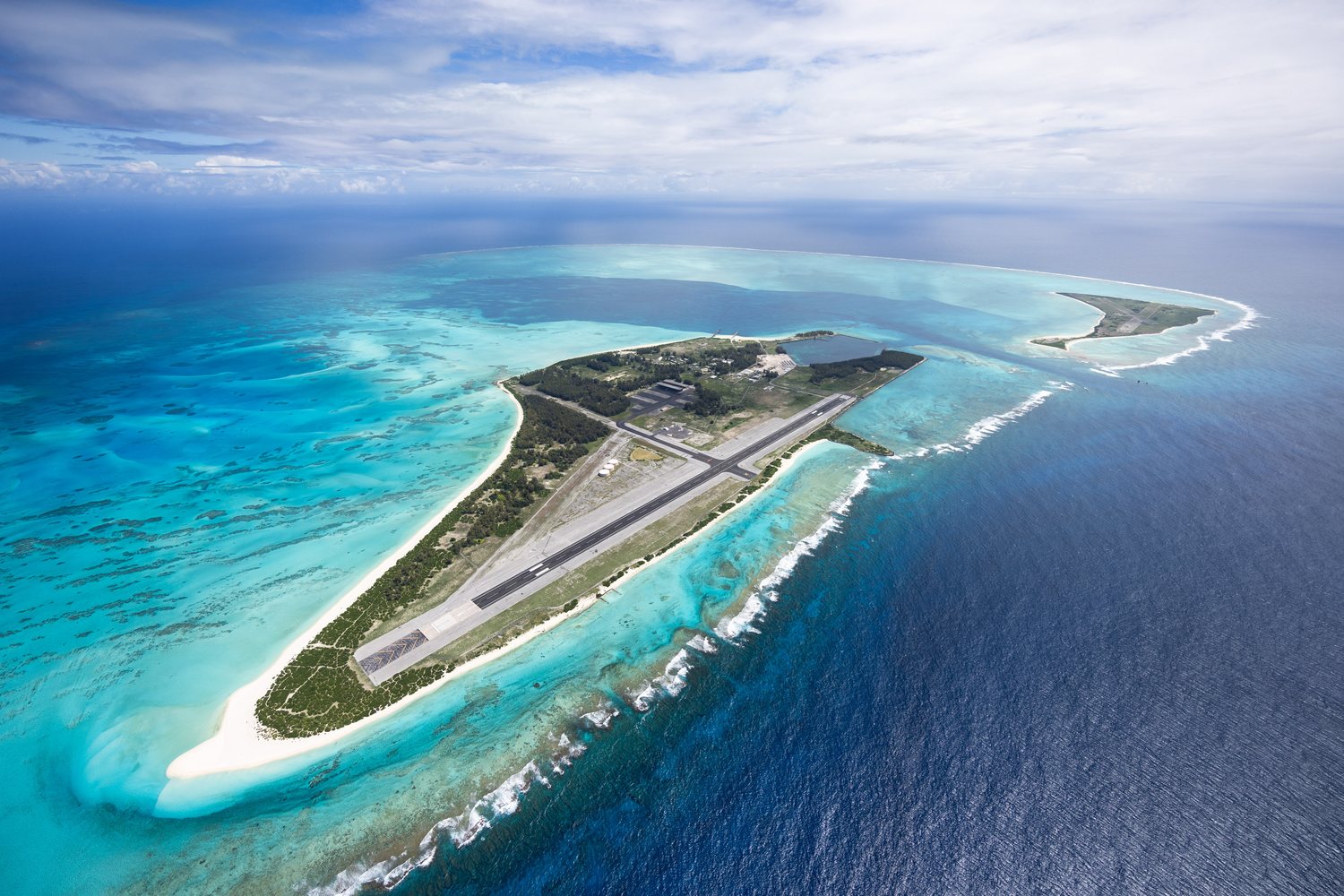 Aerial view of Midway Atoll with Sand Island and Eastern Island
